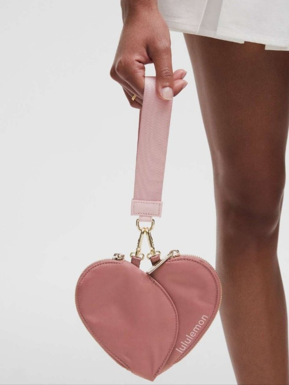 lululemon dusty pink heart wristlet with strap